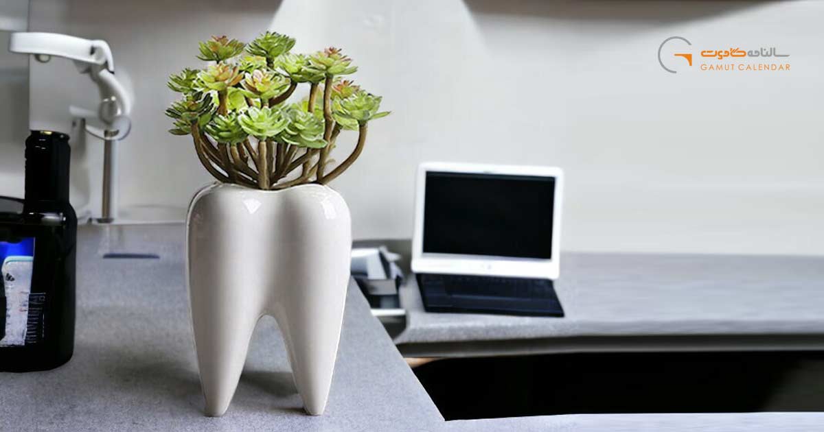 گلدان دندان شکل یکی از زیباترین هدایا تبلیغاتی برای روز دندانپزشک است.